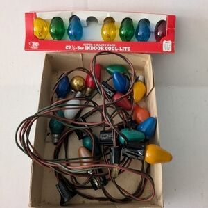 Vintage Christmas lights  Multicolor and extra bulbs.